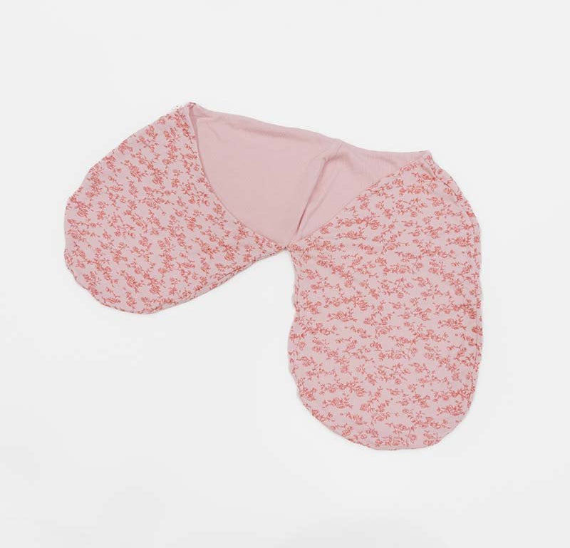 Delicate Bitty Pink Blooms artwork on a Cocoon swaddle baby blanket in Silky Modal fabric styles.