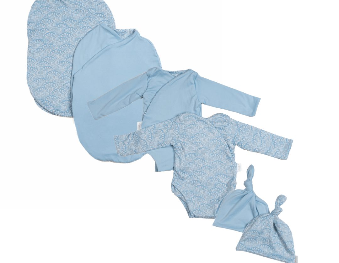 Newborn bundle with long sleeve essentials in classic brushed fabric with blue swells design.