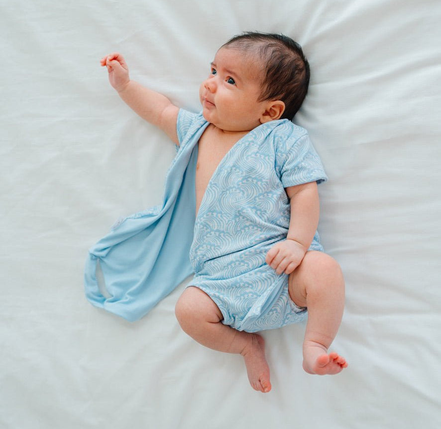 Stylish classic brushed short-sleeve winged bodysuit with the soft Blue Swells design.