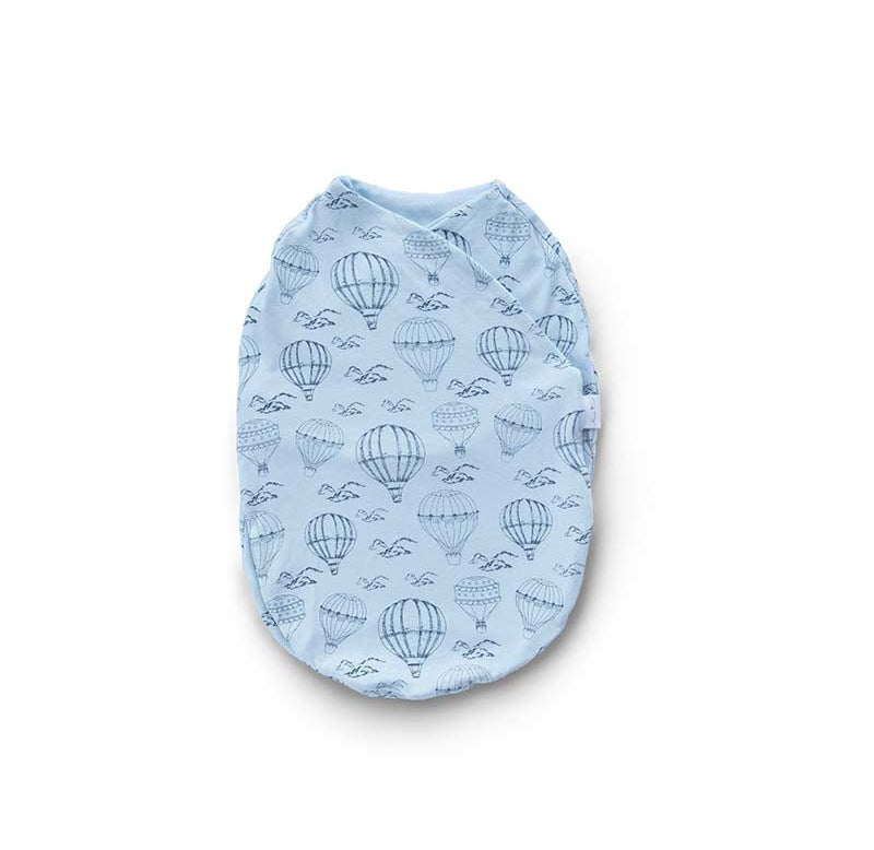 Soft baby cocoon swaddle blanket made of bamboo and organic cotton fabric with our Bon Voyage design.