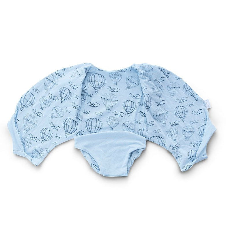 Reversible winged bodysuit for babies in bon voyage design.