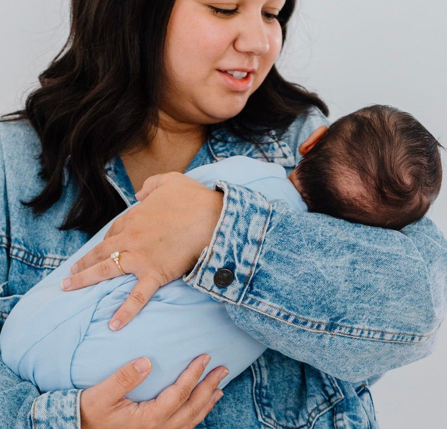 Premium baby cocoon swaddle crafted from Blue Swells Silky Modal fabric.