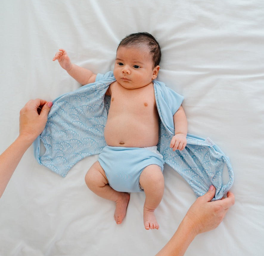 Comfortable short-sleeve winged bodysuit in Blue Swells with a soft classic brushed feel.