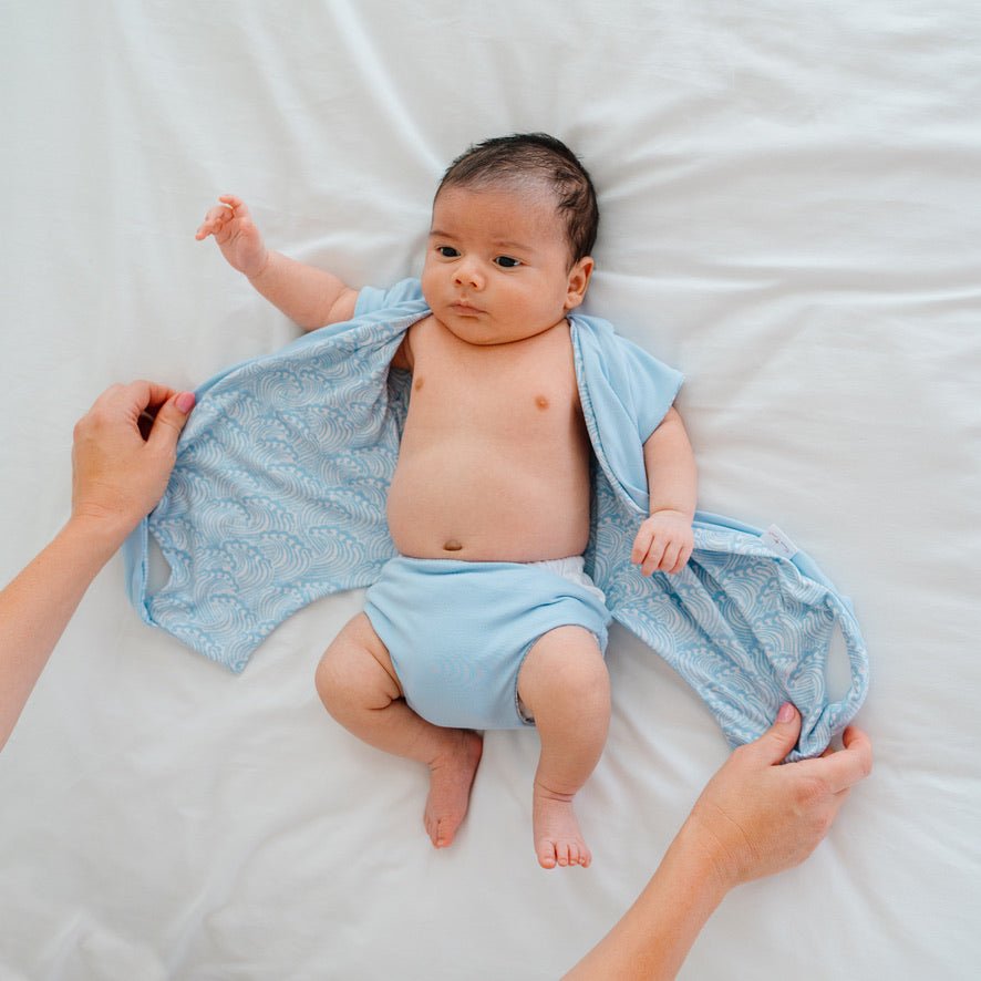 Comfortable short-sleeve winged bodysuit in Blue Swells with a soft classic brushed feel.