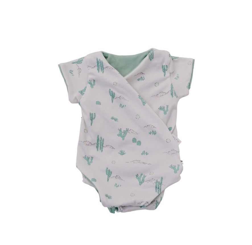 Comfortable short-sleeve winged bodysuit in Desert Sunsets with a soft classic brushed feel.