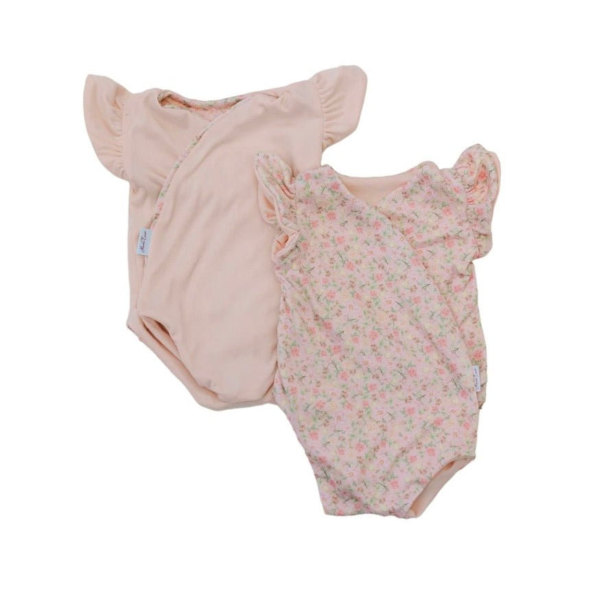 Reversible Dusty Roses baby bodysuit with short sleeves and a vintage floral design.