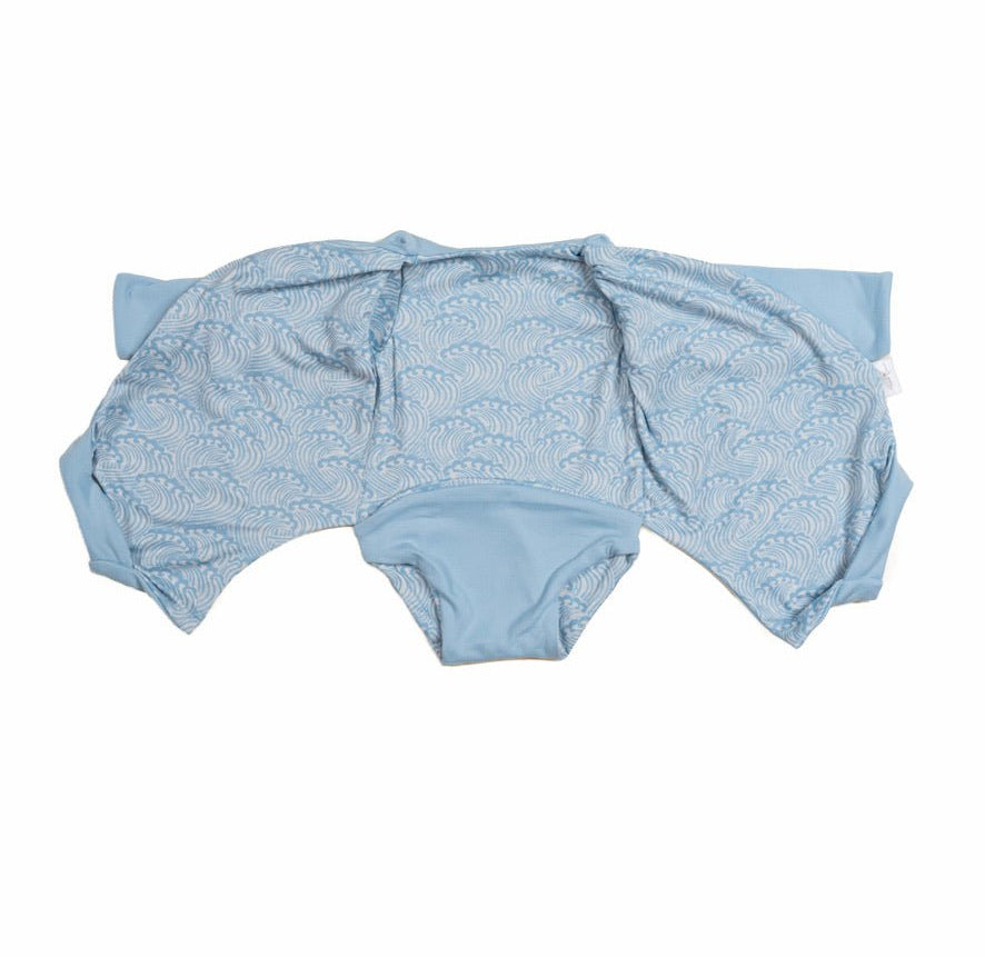 Classic brushed long sleeved baby winged bodysuit in Blue Swells design.