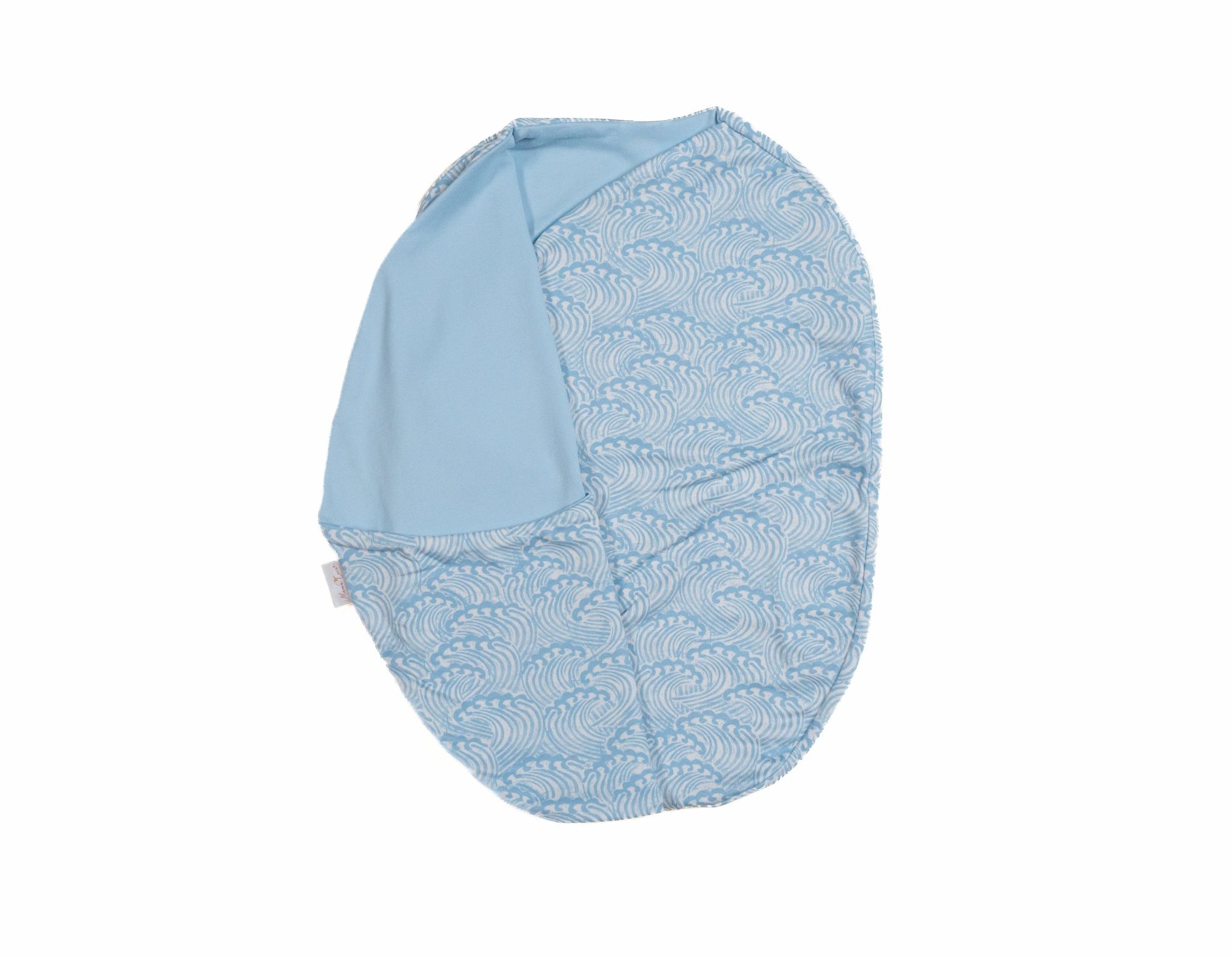 Blue swells design cocoon baby swaddle in classic brushed fabric.