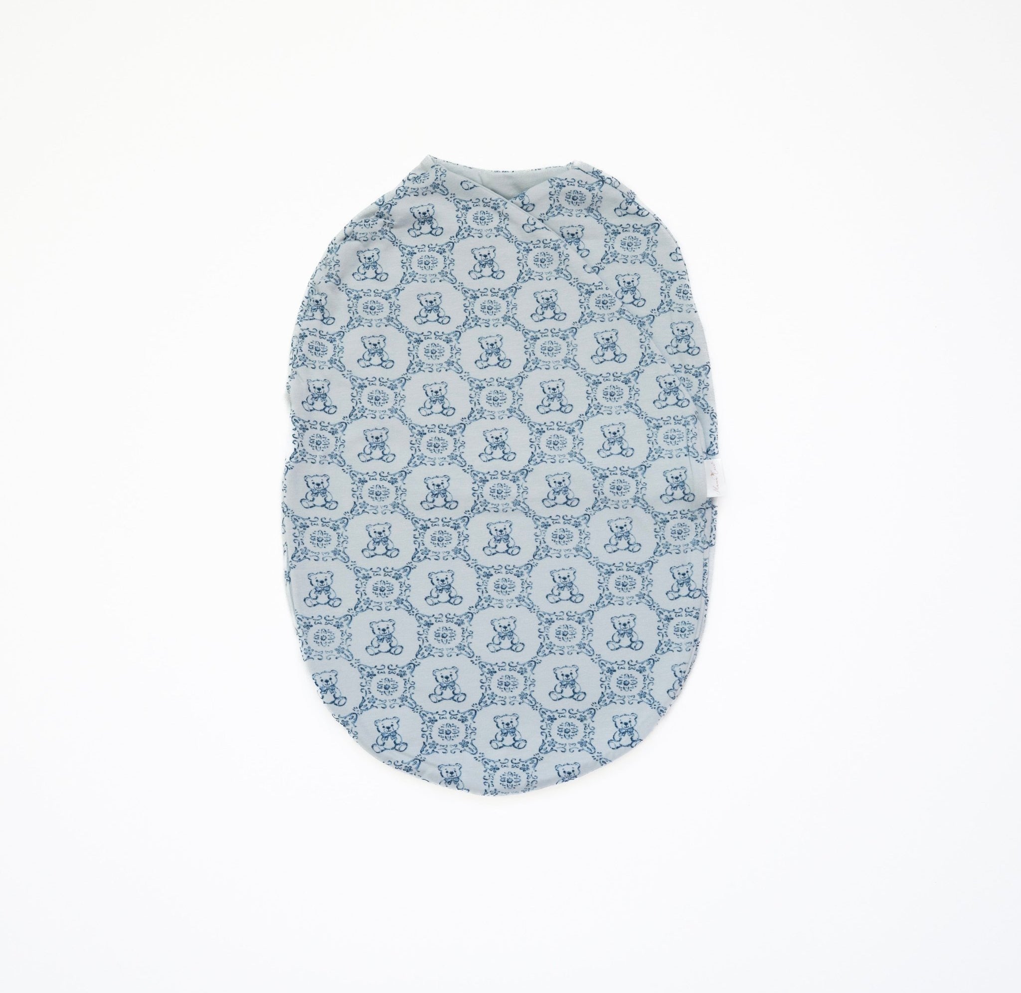 Cocoon style baby blanket bamboo cotton blend with Teddy Tiles design.