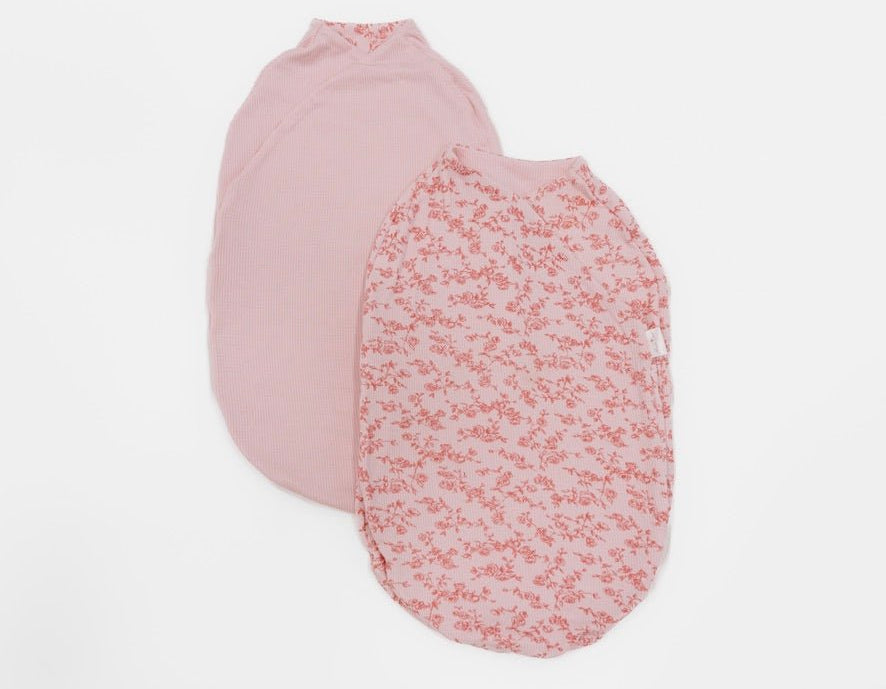 Reversible bitty pink blooms design cocoon baby swaddle in silky modal fabric.