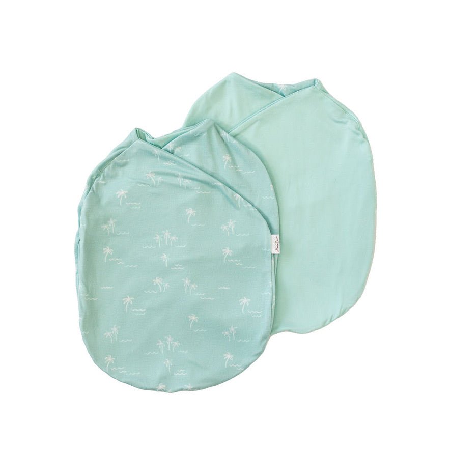 Honeydew palms design cocoon baby swaddle in classic brushed fabric.