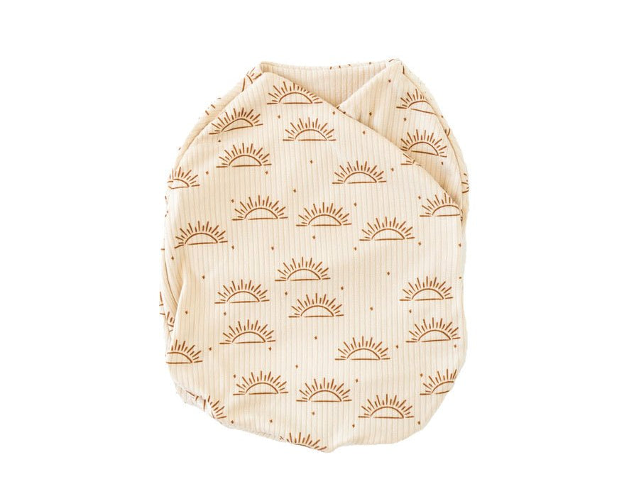 Sandy sunsets design cocoon swaddle.