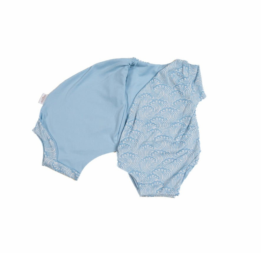 Blue Swells reversible short-sleeve winged bodysuit made from classic brushed fabric for a gentle fit.