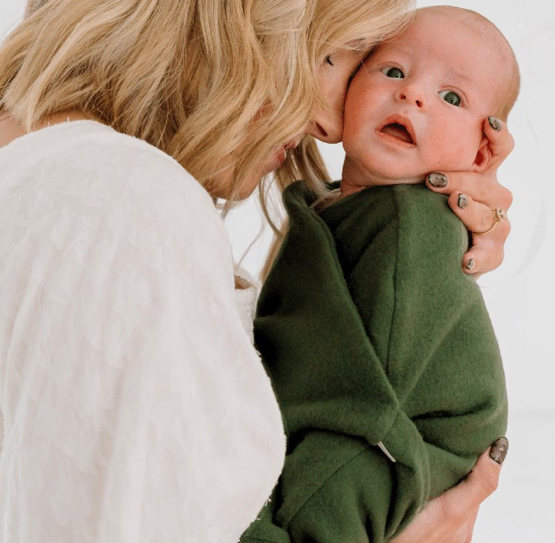 Reversible Baby Cocoon swaddle baby blanket in plush juniper pine in plush dream fabric styles.