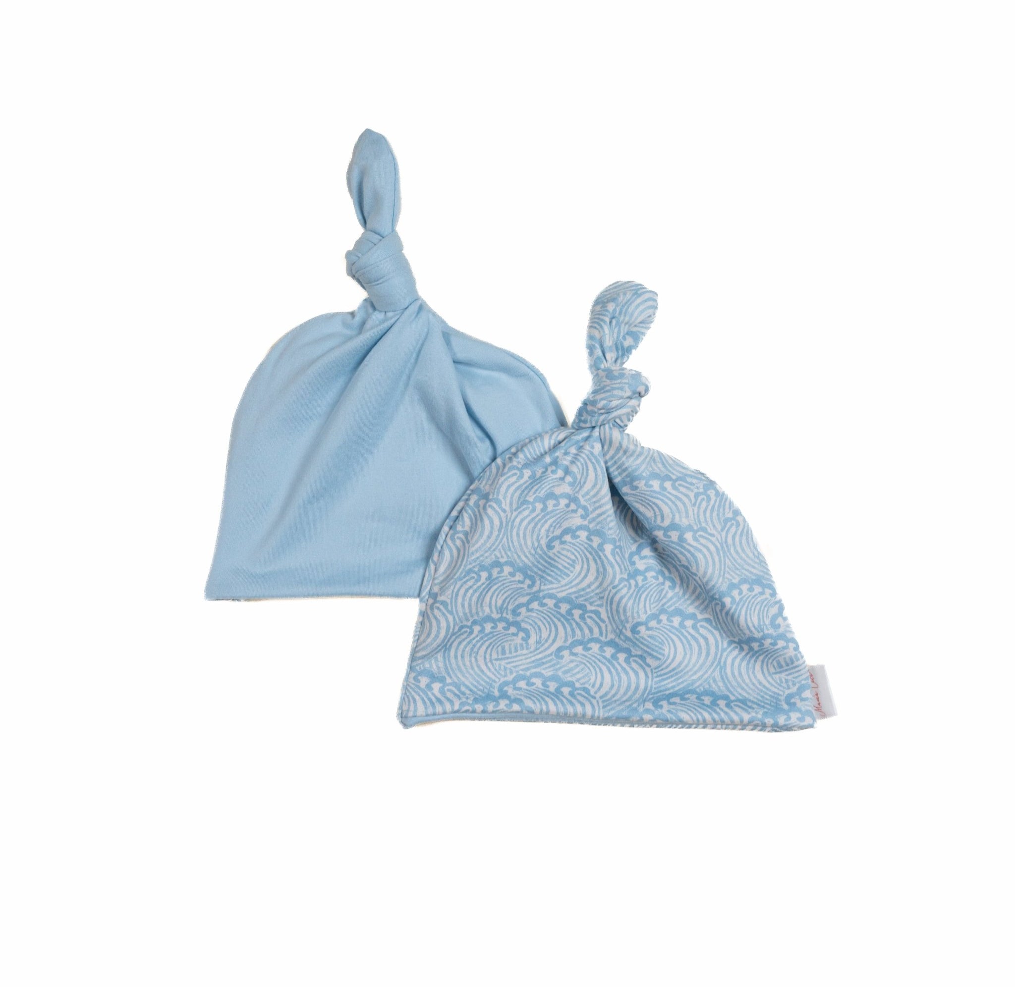 Classic brushed reversible baby beanie in Blue Swells for a soft everyday accessory.