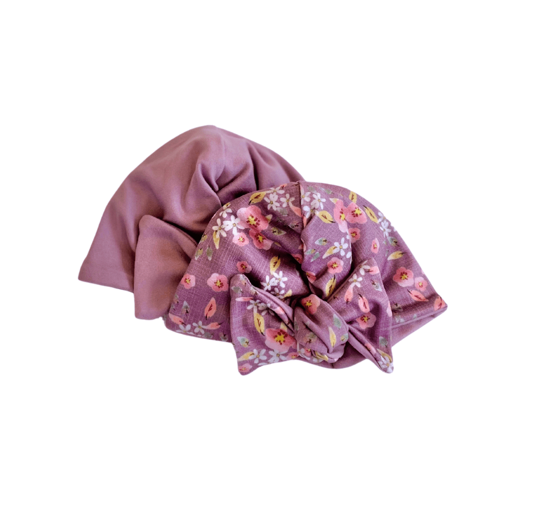 Soft classic brushed ruched baby beanie with bow in the Peachy Lilac design for newborn comfort.