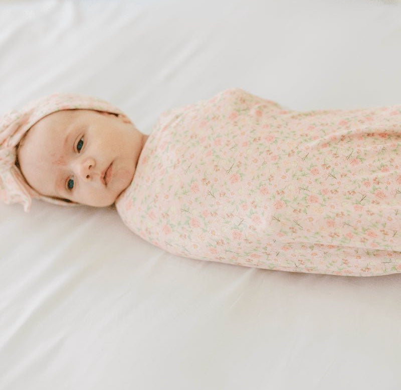 Premium baby cocoon swaddle crafted from Dusty Roses Silky Modal fabric.