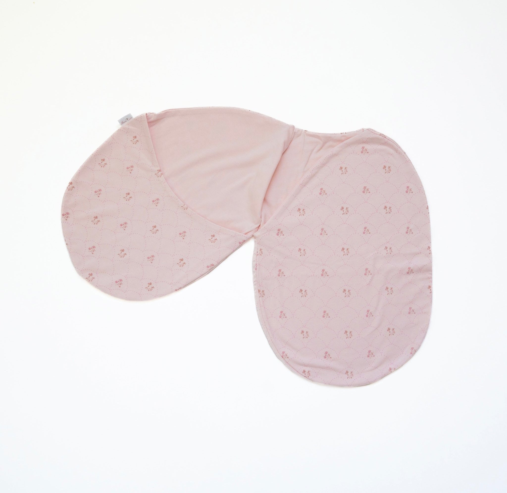 Lightweight cocoon swaddle blanket for babies in bamboo and organic cotton with a Dainty Dots pattern.