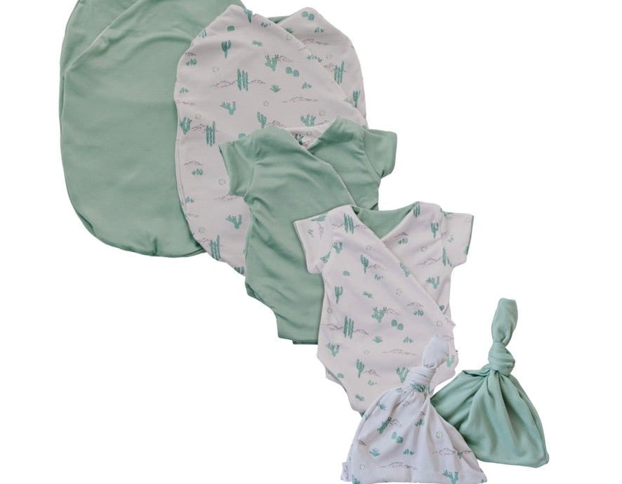 Newborn essentials bundle with short sleeves in classic brushed fabric with desert sunsets design.