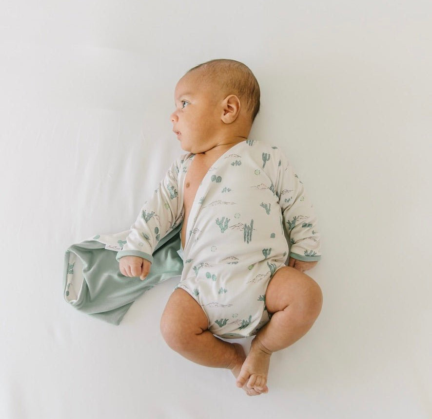 Desert Sunsets design baby winged bodysuit in classic brushed fabric.