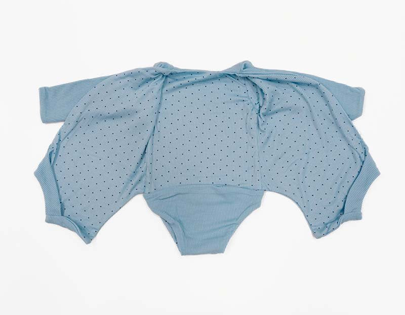 Long sleeved winged bodysuit for babies in silky modal fabric.