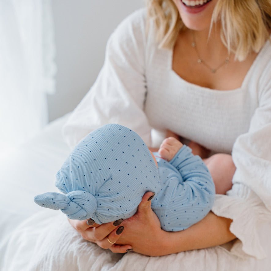 Soft and elegant knotty beanie in Dotted Blues fabric.
