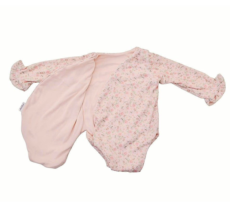Baby long sleeve bodysuit in Dusty Roses design brushed fabric featuring wing details and ruffle cuffs.