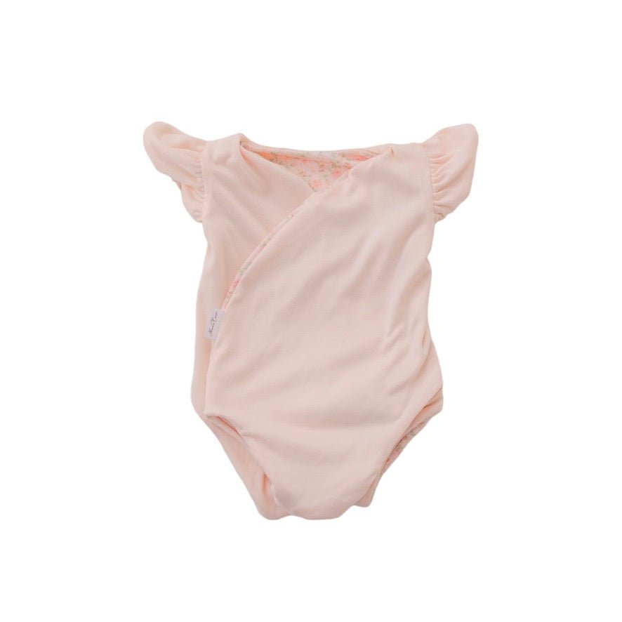 Reversible Dusty Roses floral baby bodysuit with comfortable short sleeves.