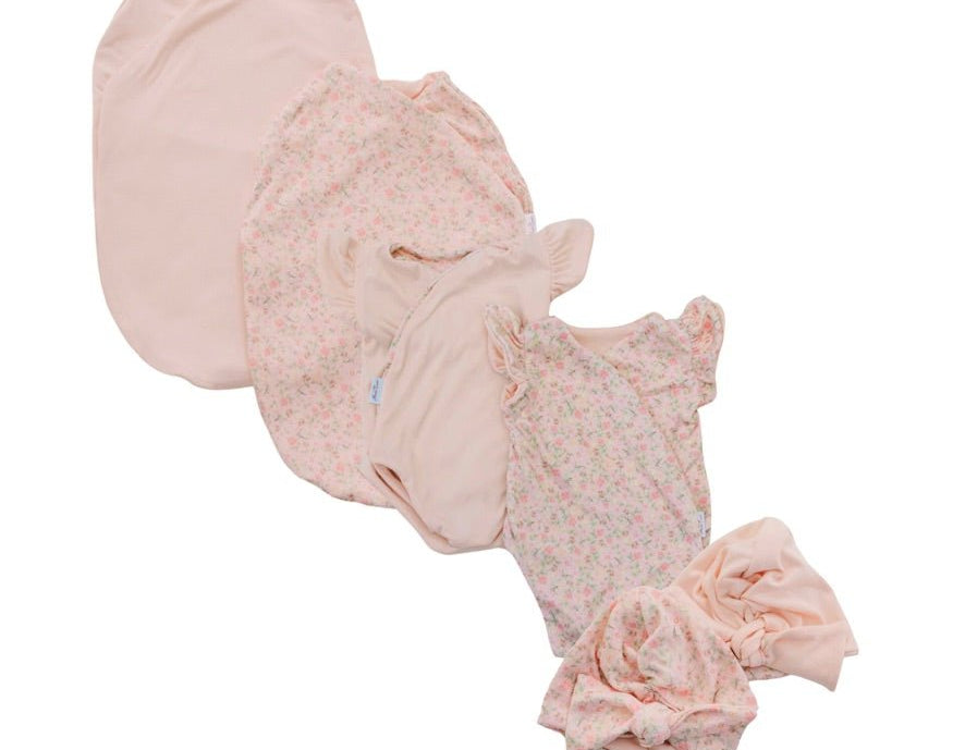 Newborn essentials bundle with flutter sleeves in classic brushed fabric with dusty roses design.