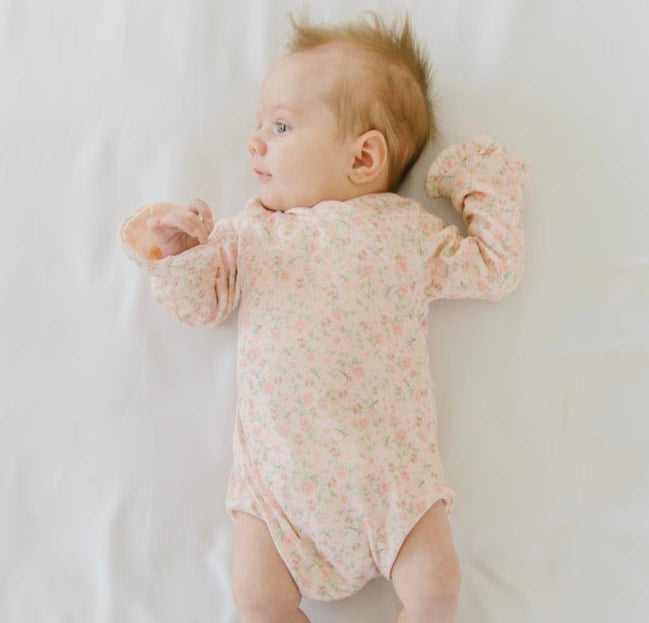 Ruffle cuff baby bodysuit with wings in Dusty Roses design classic brushed fabric for babies.