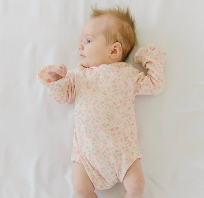 Ruffle cuff baby bodysuit with wings in Dusty Roses design classic brushed fabric for babies.