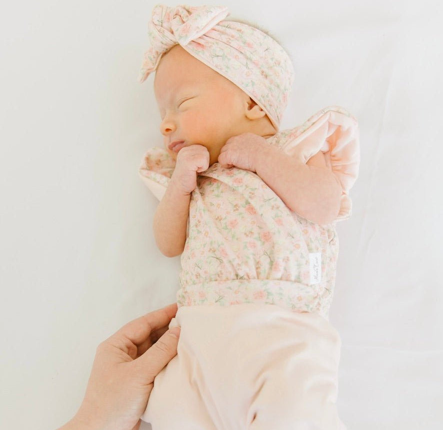 Dusty Roses short-sleeve bodysuit for baby in Classic Brushed fabric styles with a vintage floral print.