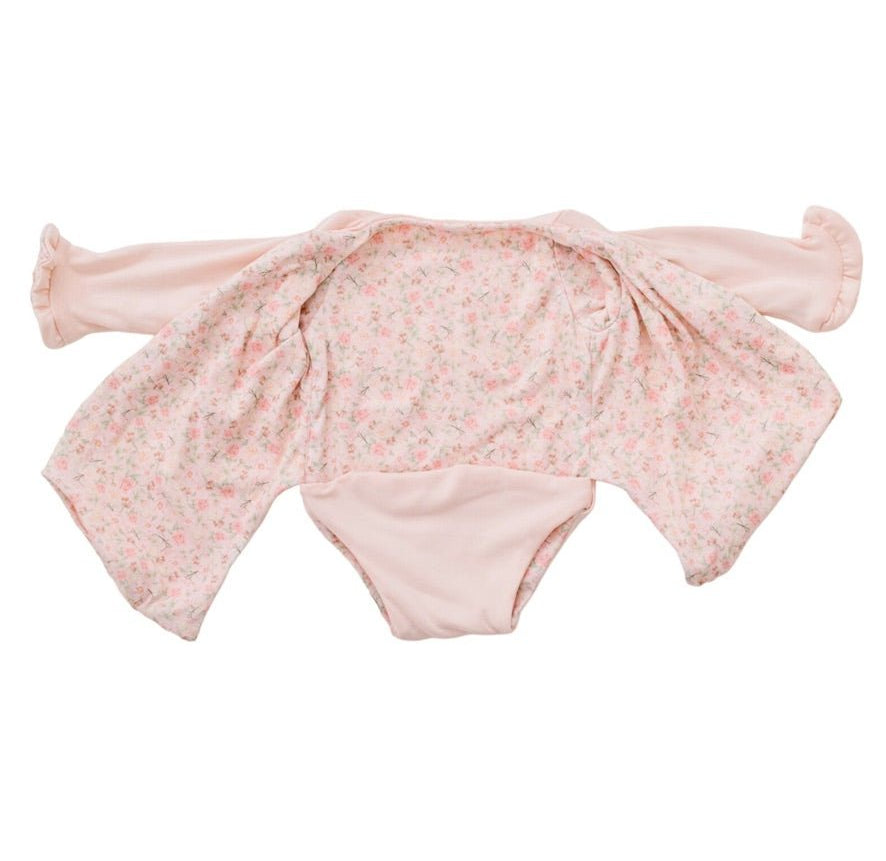 Baby long sleeve bodysuit in Dusty Roses design brushed fabric featuring wing details and ruffle cuffs.