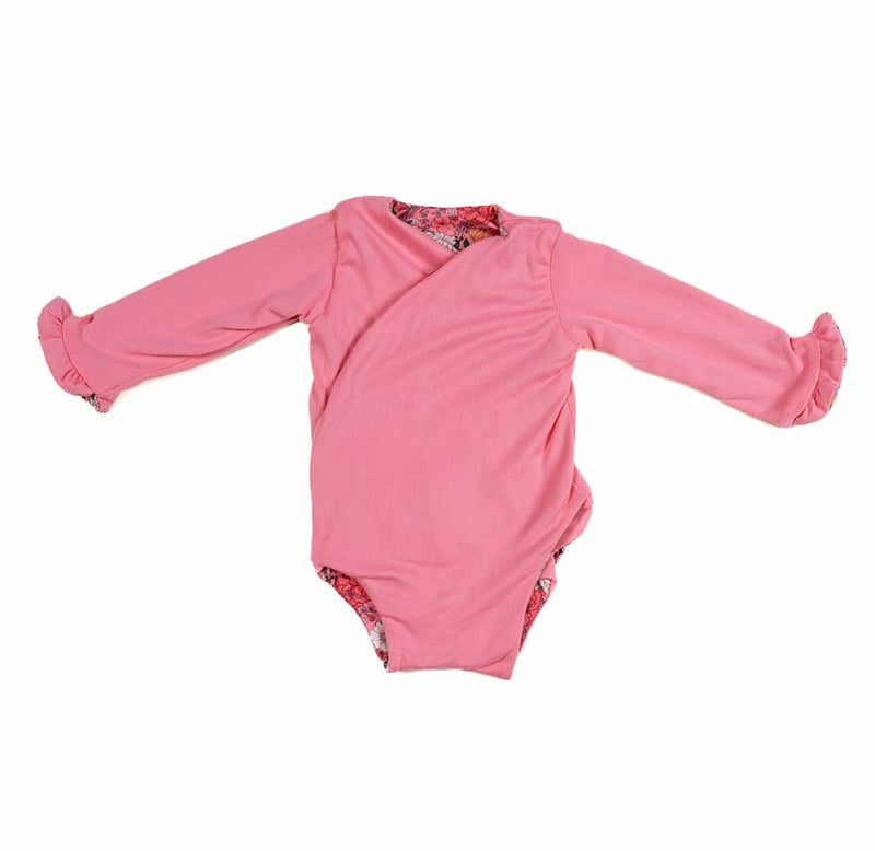 Stylish winged baby bodysuit with ruffle cuffs in soft Flower Power design classic brushed fabric with a reversible design.