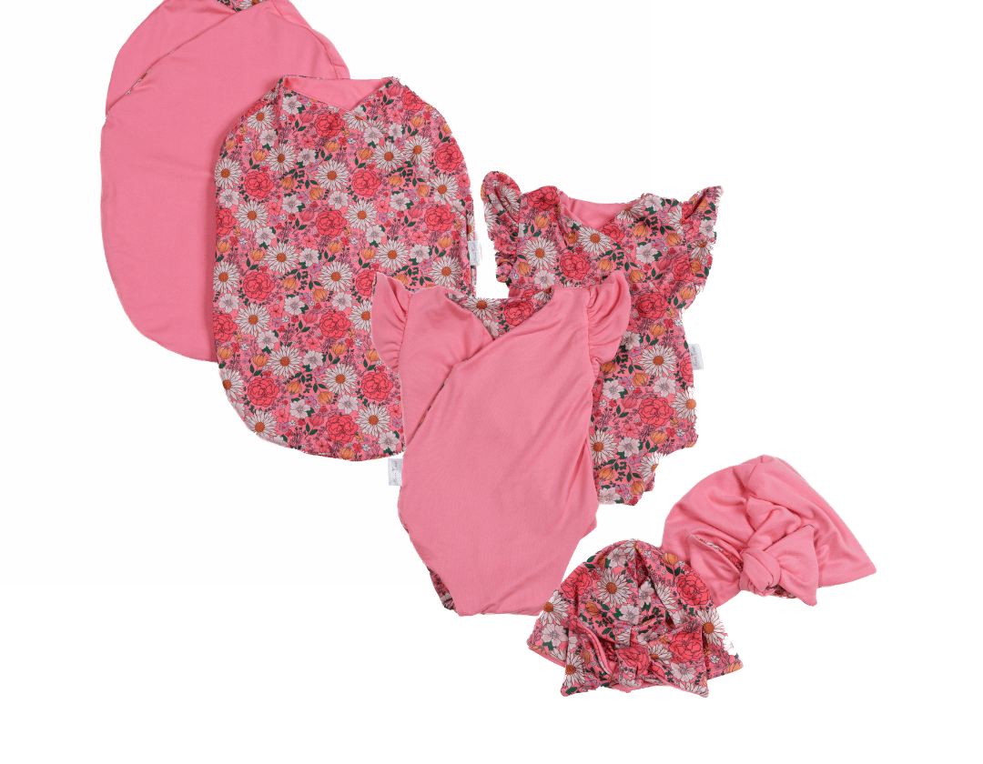 Newborn essentials bundle with flutter sleeves in classic brushed fabric with flower power design.