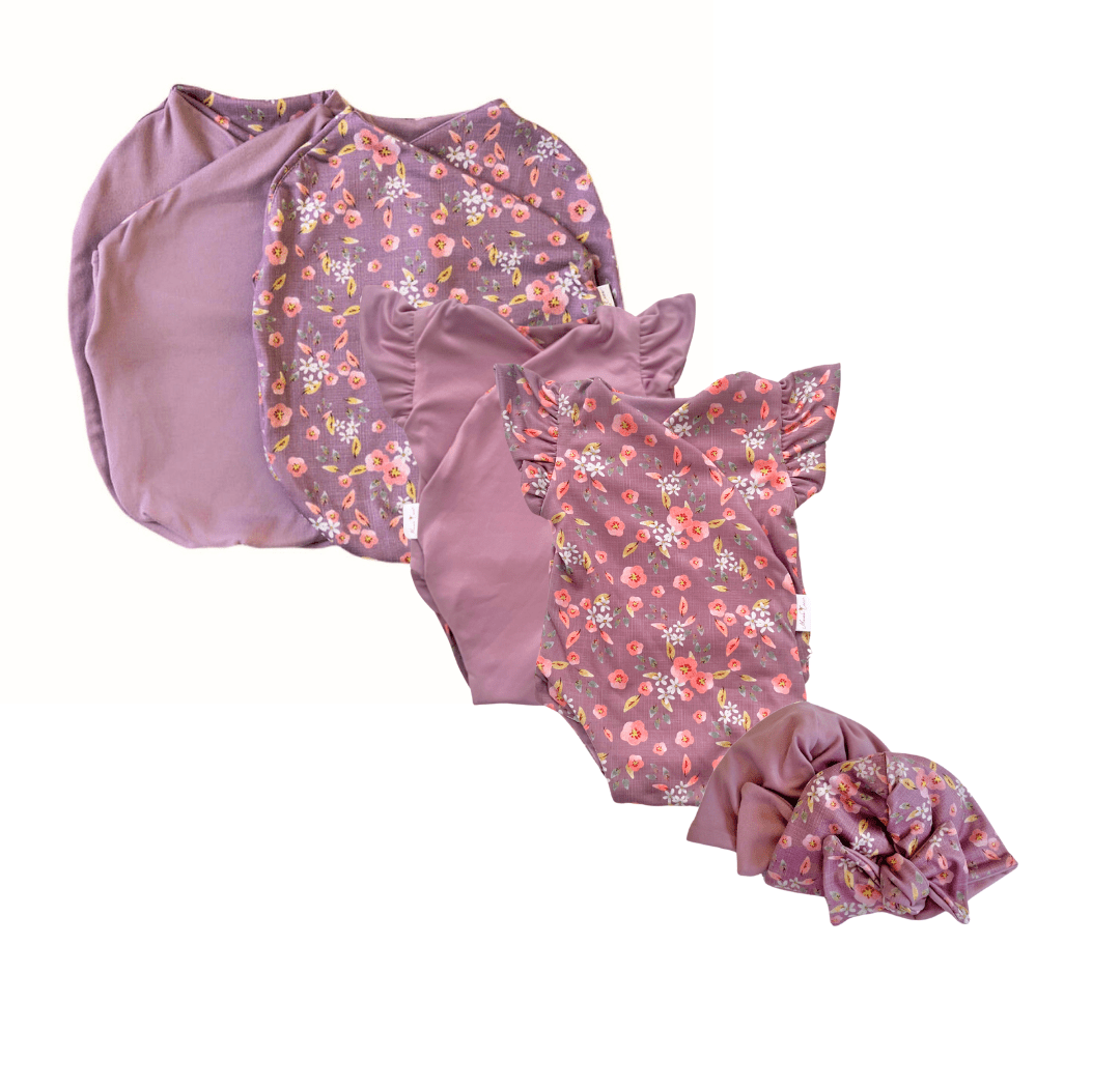 Newborn essentials bundle with flutter sleeves in classic brushed fabric with peachy lilac design.