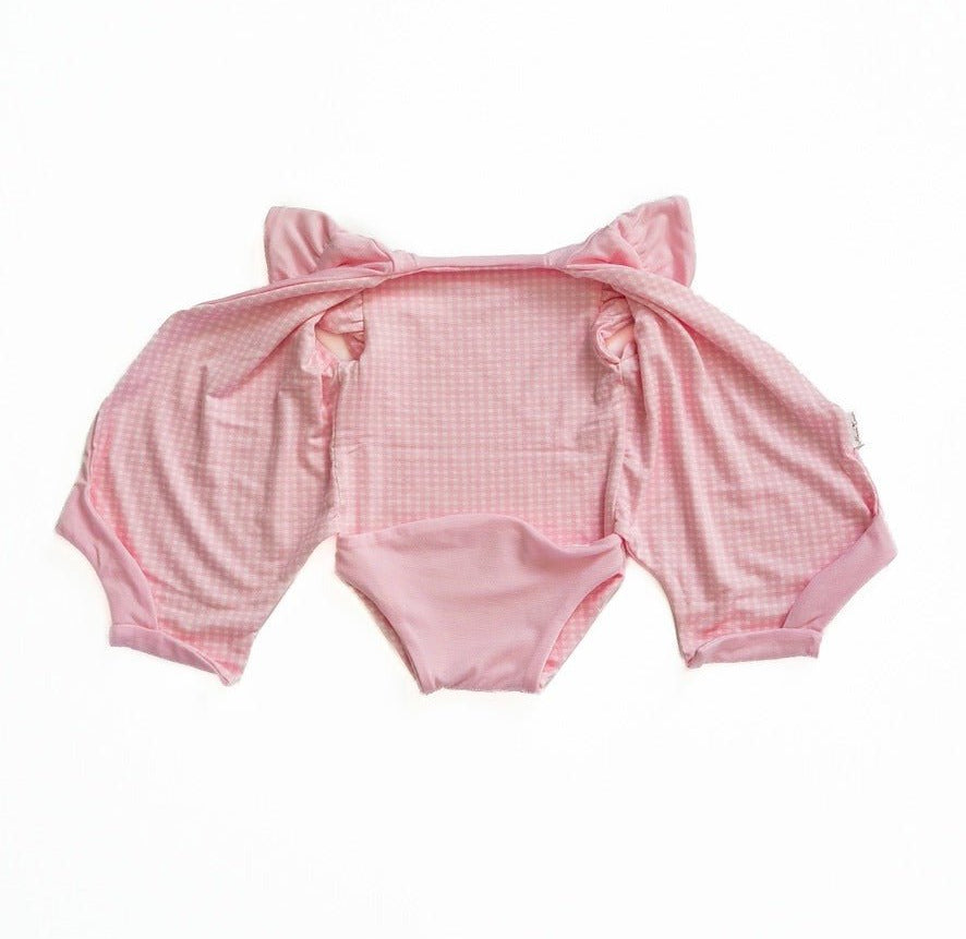 Reversible Baby Pink Gingham design flutter sleeve baby onesie in silky modal fabric.