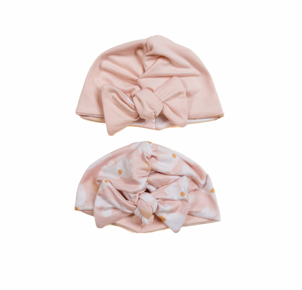 Soft reversible ruched baby beanies with bow made from classic brushed fabric in the Dusty Roses design.