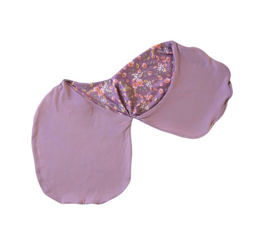 Baby cocoon swaddle blanket made with smooth Silky Modal in Peachy Lilac print.
