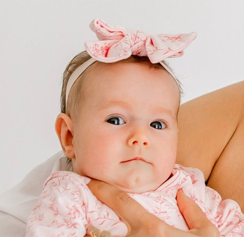 Bamboo cotton baby headband & bow set in whimsical garden design.