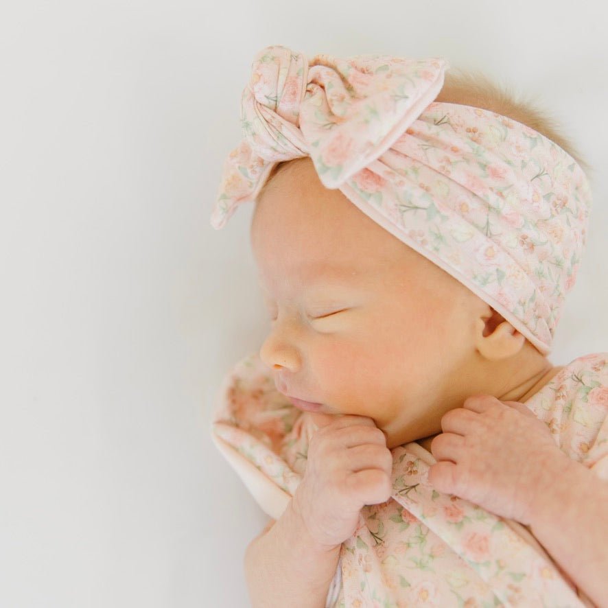 Headwrap with bow in Dusty Roses design, made from classic brushed fabric.