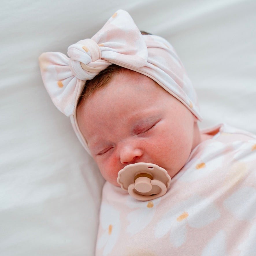 Headwrap with bow in Sweet Lily design, made from classic brushed fabric.