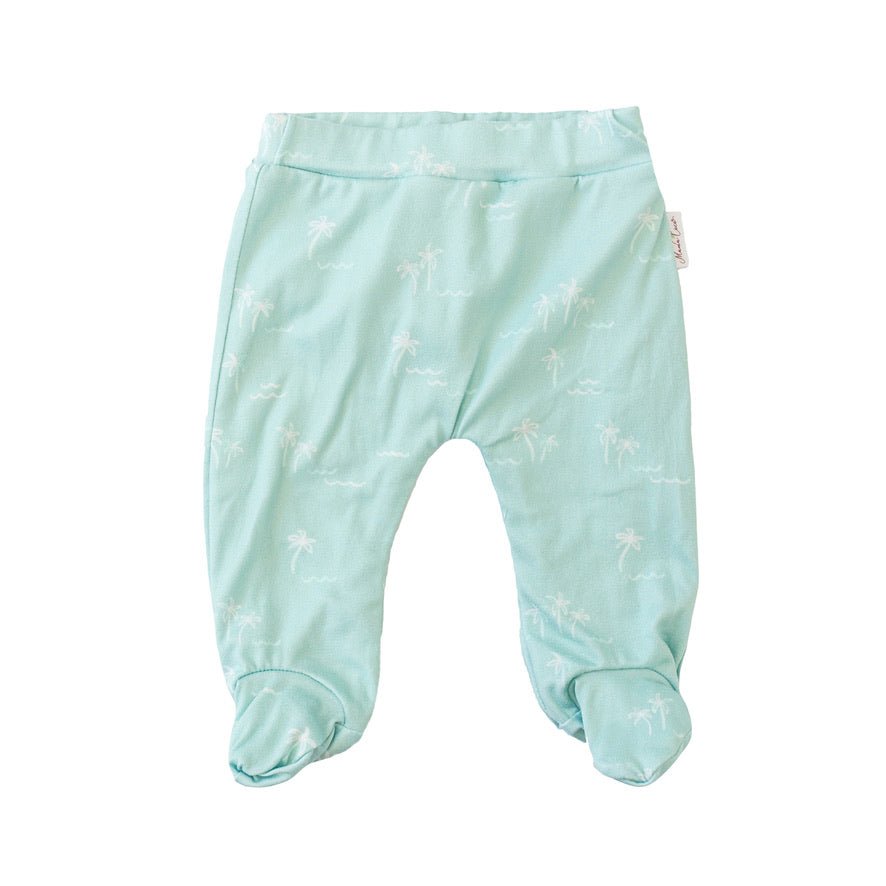 Baby footie pants crafted from a soft bamboo cotton fabric featuring the Honeydew Palms print.