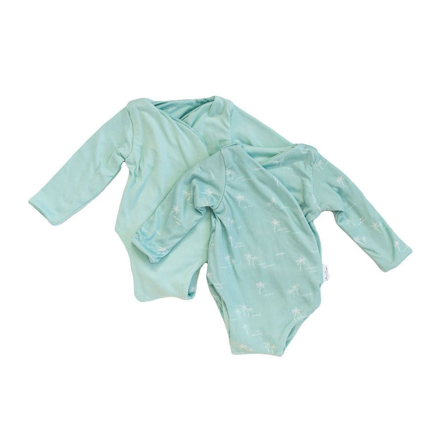 Honeydew palms design long-sleeve baby onesie in classic brushed fabric.