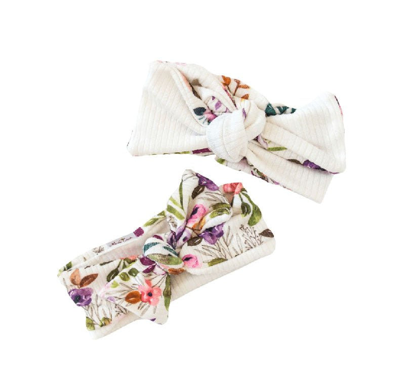 Premium Ivory Wildflowers bow headwraps designed for babies.