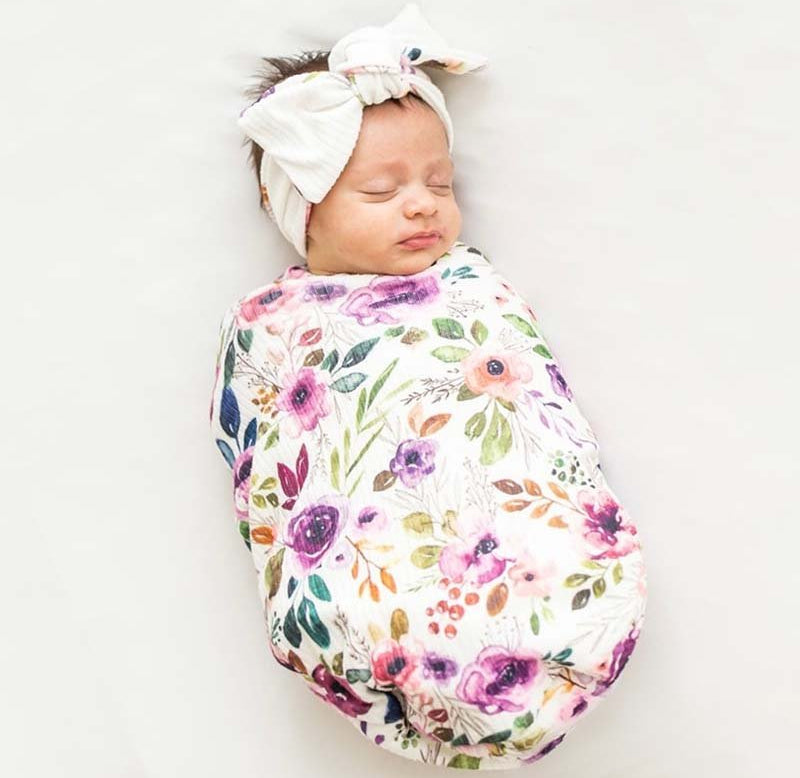 Ivory wildflowers design baby cocoon swaddle.