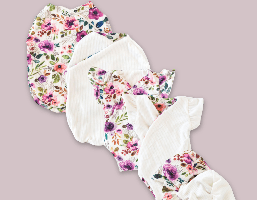Newborn essentials bundle with flutter sleeves in classic brushed fabric with ivory wildflowers design.