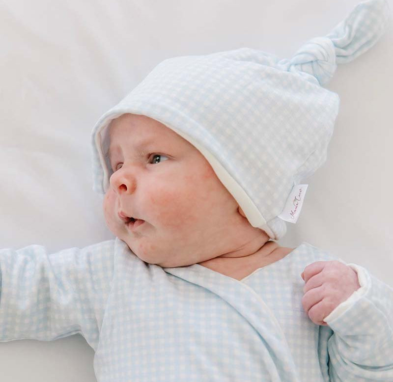 Baby blue gingham beanie from our long-sleeve onesie outfit bundle.