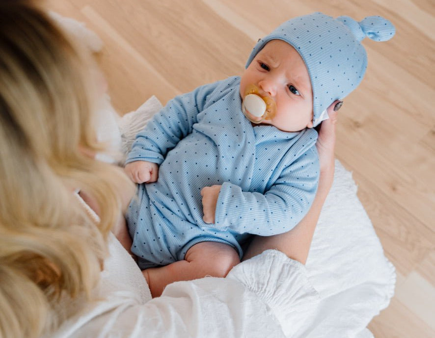 Soft and elegant knotty beanie in Dotted Blues fabric.