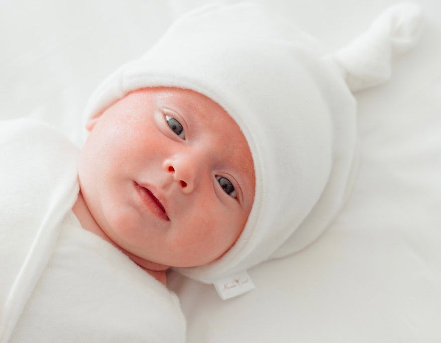 Knotty beanie in Plush Perfection design, made from Plush Dream fabric.